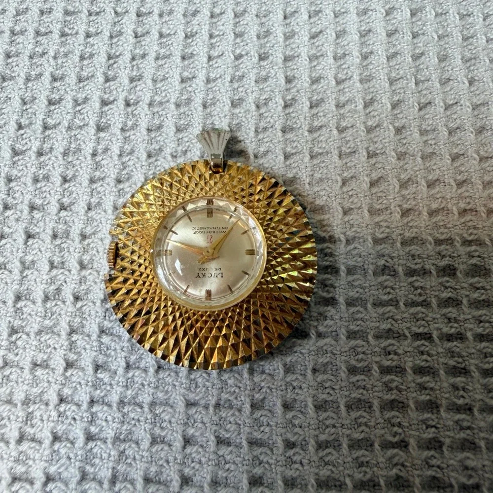 Vintage Lucky De Luxe 21 Jewel Pendant Watch Gold Tone Sunburst Waterproof